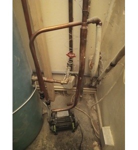 Emergency plumber shutting off mains water valve at night