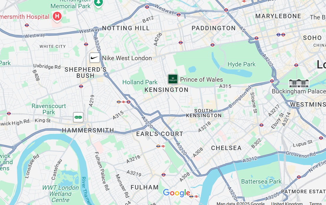 Emergency plumber attending burst pipe at night in West London